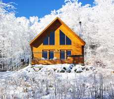 Chalet en bois rond avec spa aux Chalets Évasion