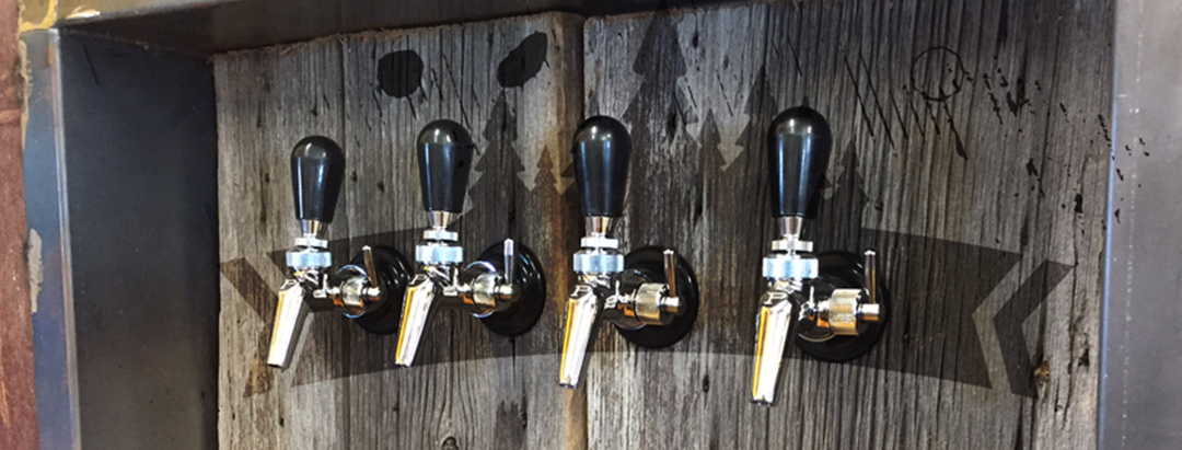Spout of four different beers.